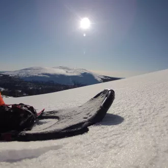 Snowboarder on the top of the mountain